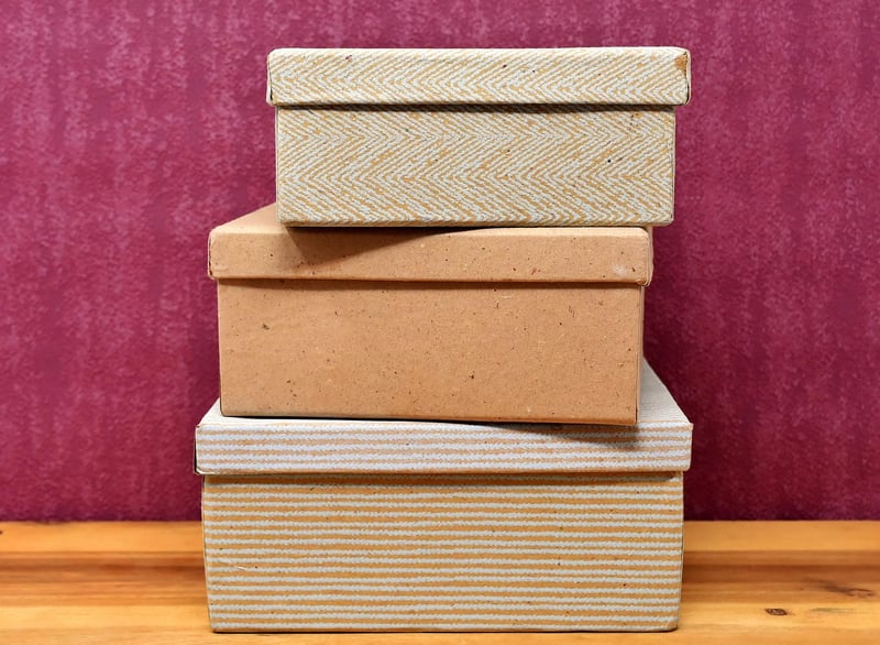 Kids playing with cardboard